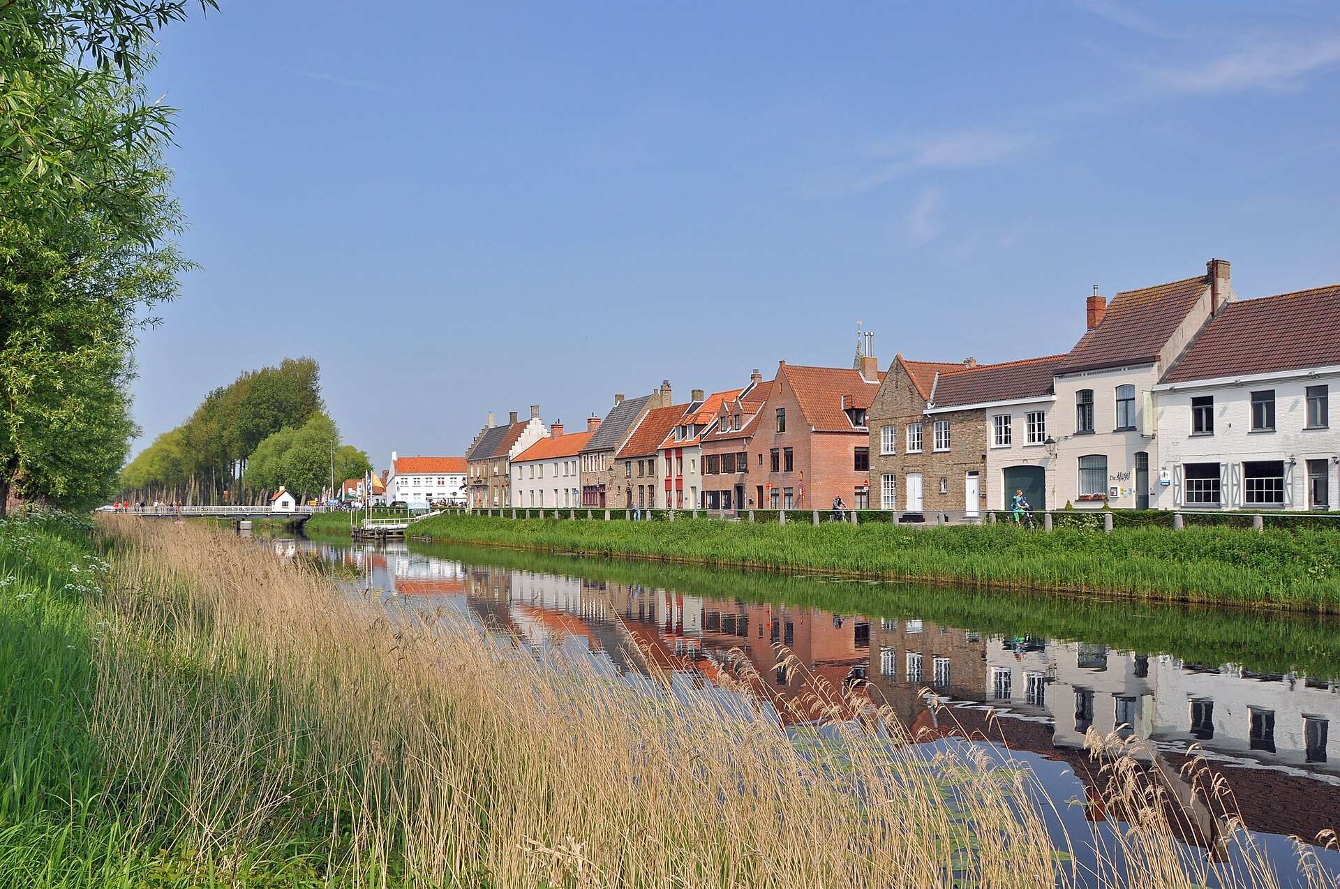 Canal houses reflected in the Damse Vaart, Damme